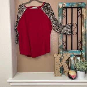 Chic Red Women's Top with Leopard Print Sleeves
